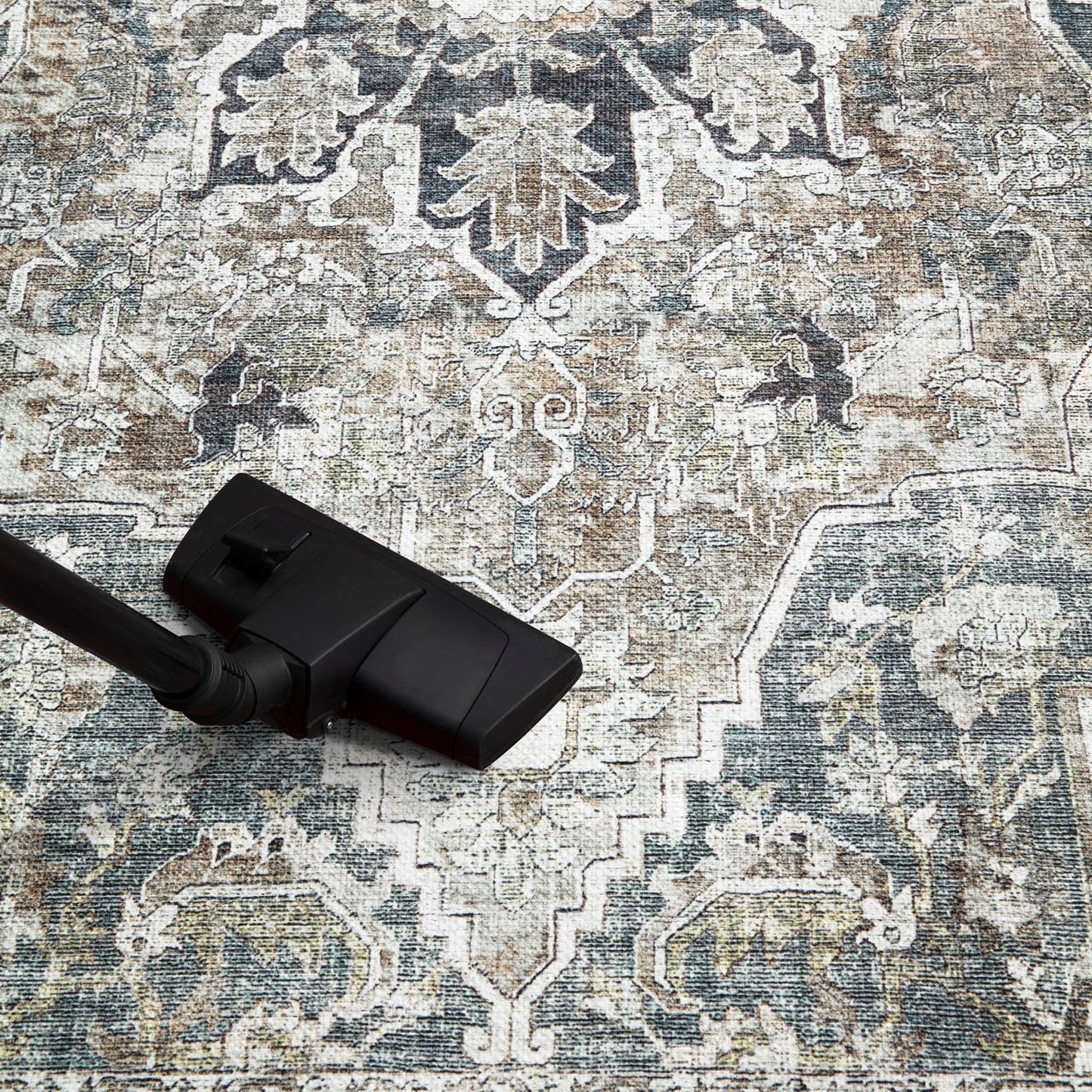 Top-down view of the ivory and teal antique Agra Indo-Persian rug