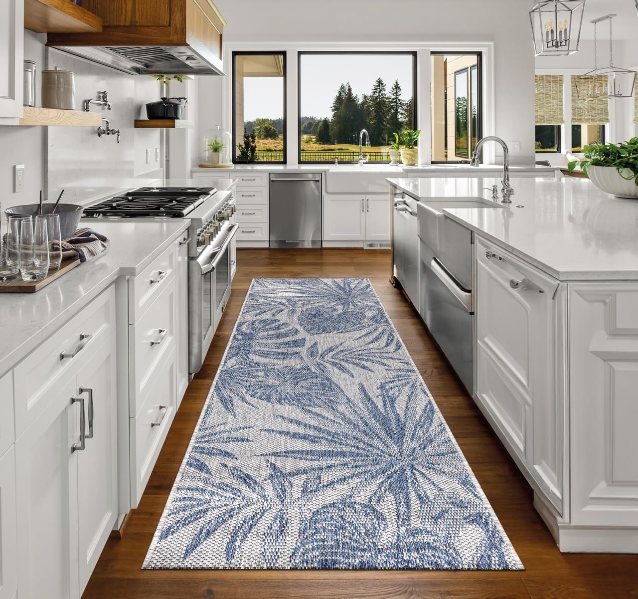 Top-down view of the navy and ivory tropical jungle outdoor rug