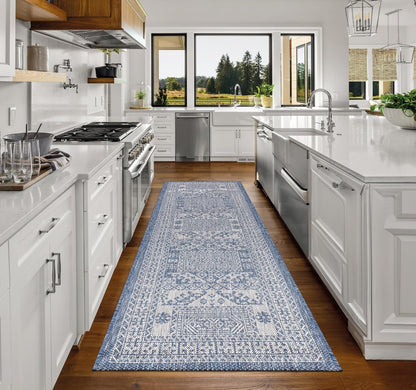 Top-down view of the Navy and gray tribal heritage outdoor rug