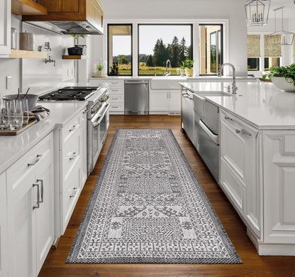Top-down view of the Black and gray tribal heritage outdoor rug