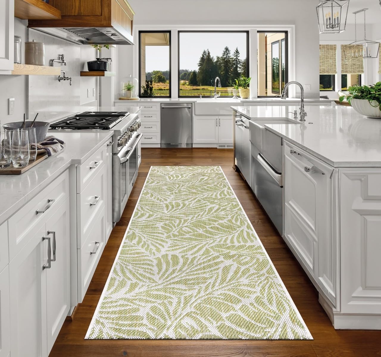Top-down view of the Green and ivory tropical leaf outdoor rug