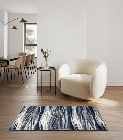 Round navy abstract rug in a reading nook