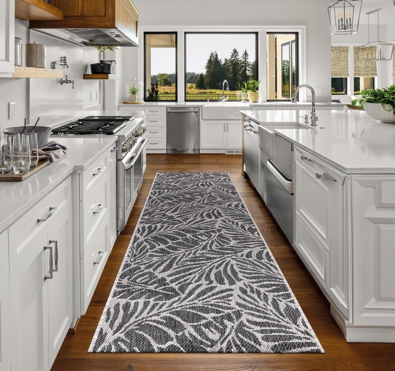 Top-down view of the Black and gray tropical leaf outdoor rug