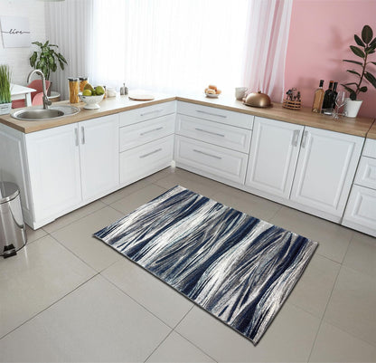 Navy art-inspired rug in a transitional dining room
