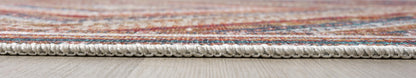 Detail of the geometric zigzag and star motifs on the cream rug