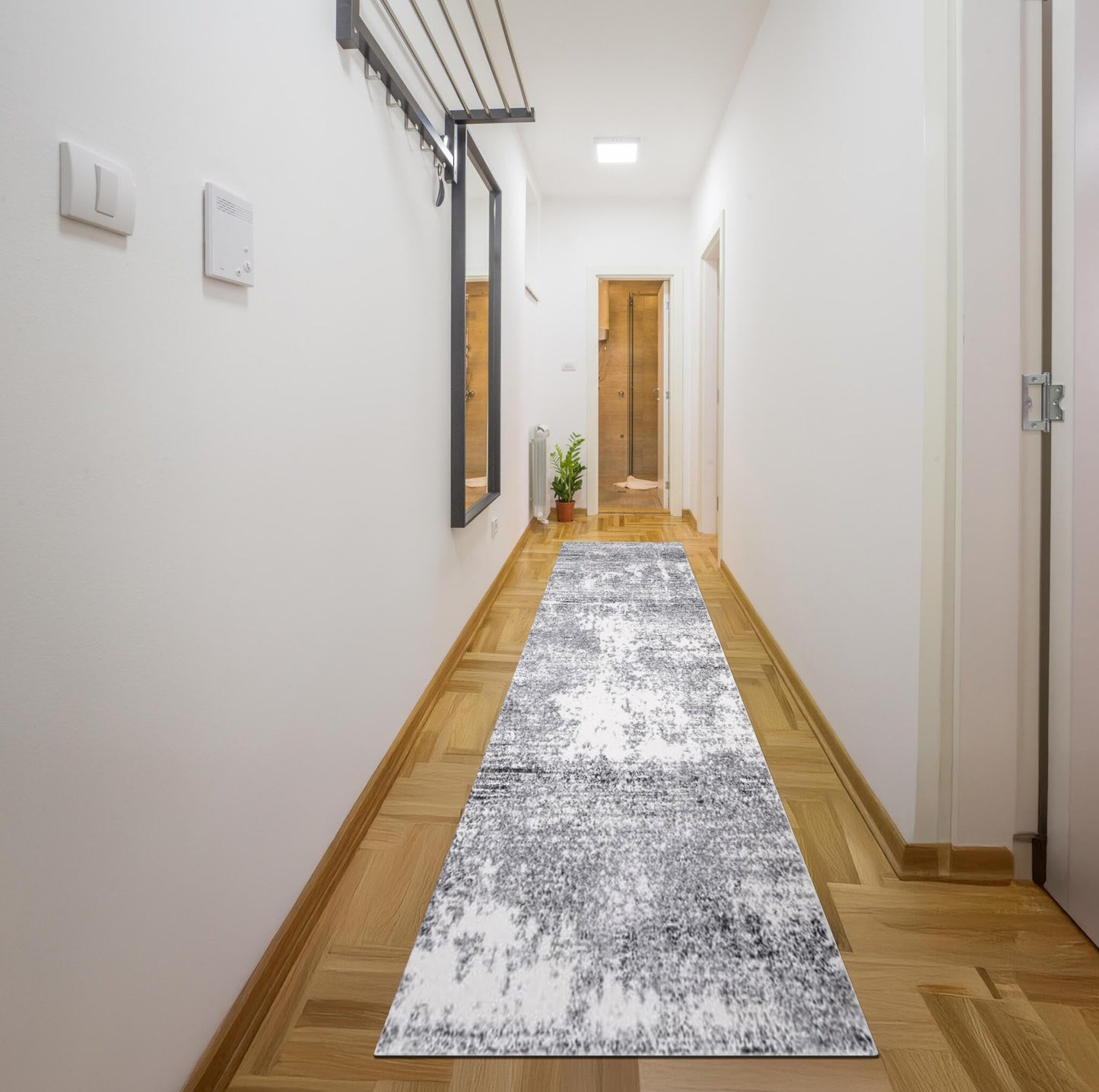 Cream and gray abstract rug in a transitional dining room