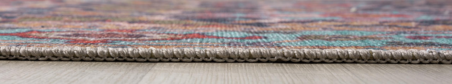 Detail of the rust and ochre floral motifs on the teal field