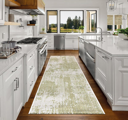 Top-down view of the Green and ivory modern abstract outdoor rug