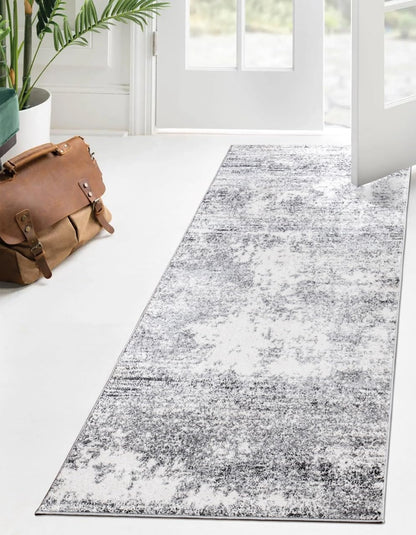 Soft watercolor rug in a coastal-inspired bedroom