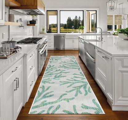 Top-down view of the Green and ivory coral pattern outdoor rug
