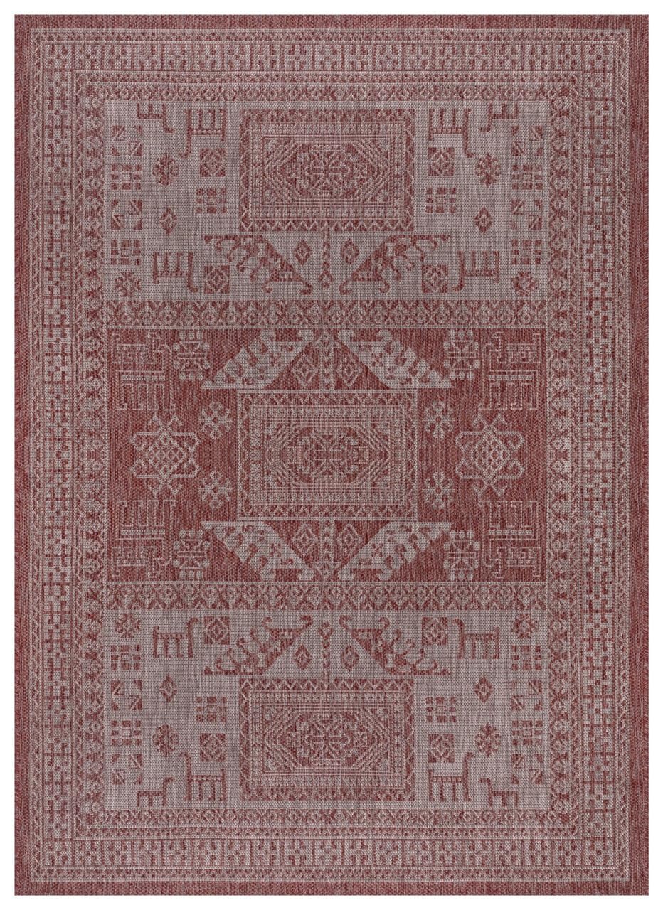 Terracotta and gray tribal heritage outdoor rug on covered teak patio
