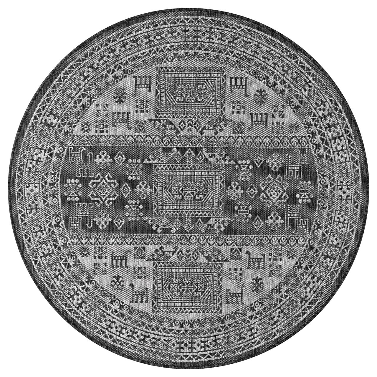 Black tribal rug in southwestern-style screened porch setting