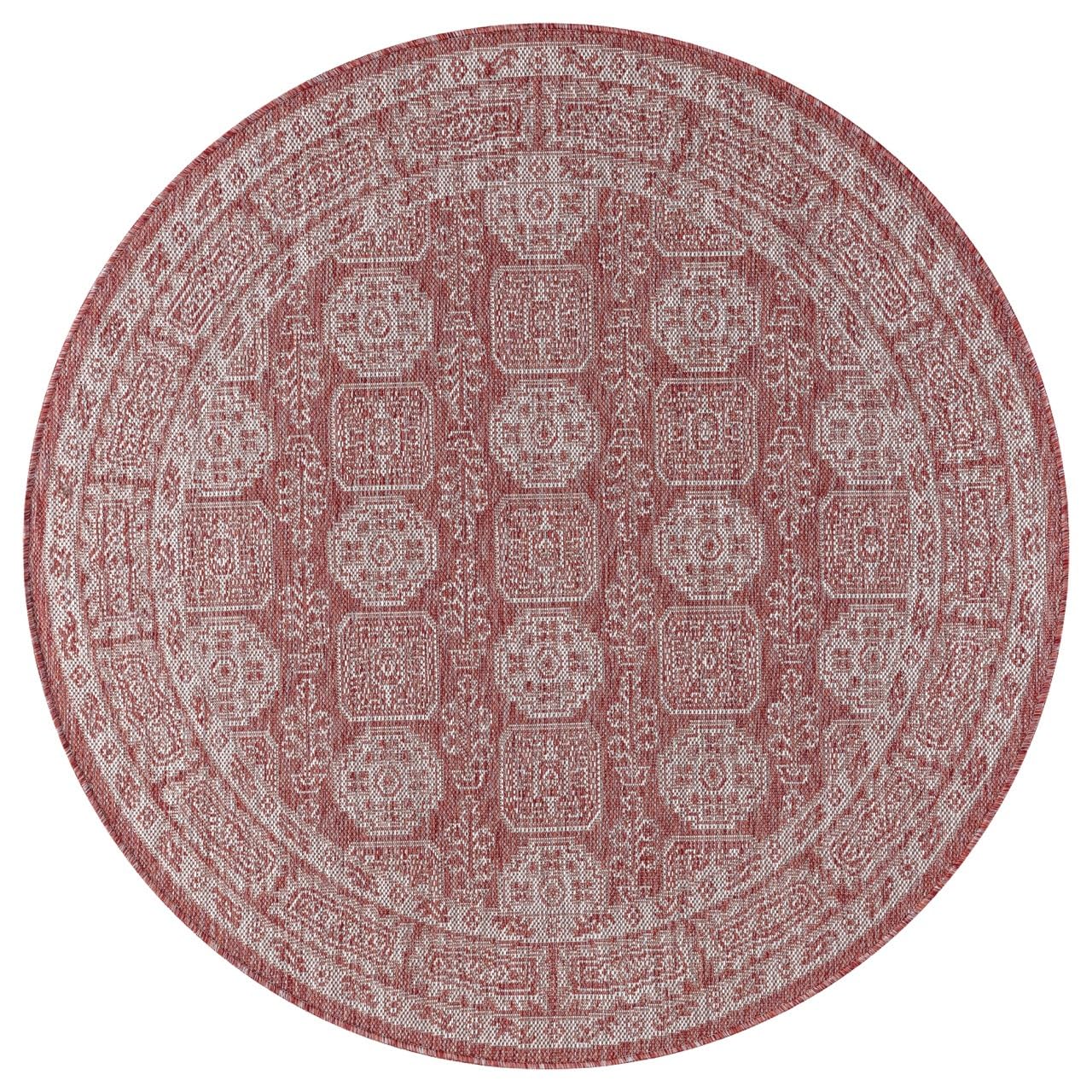 Terracotta weatherproof Anatolian rug on cedar deck with lounge chairs