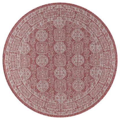 Terracotta weatherproof Anatolian rug on cedar deck with lounge chairs
