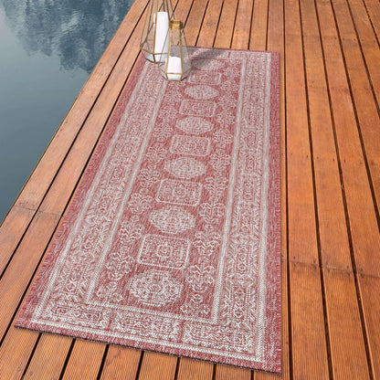 Anatolian heritage outdoor rug styled with mediterranean dining furniture