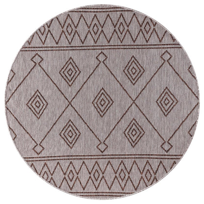 Brown Moroccan rug in modern farmhouse screened porch setting