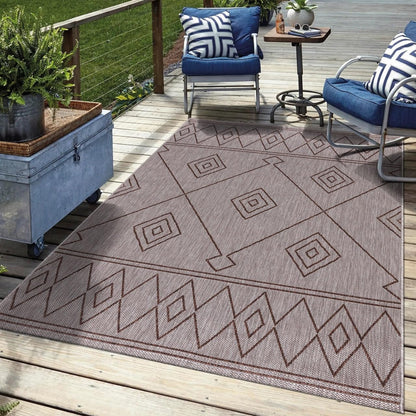 Brown Berber outdoor rug in garden seating area with greenery
