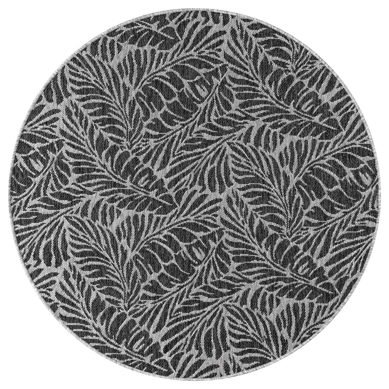 Black tropical rug in conservatory screened porch setting