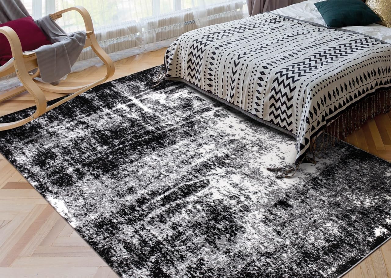 Black abstract rug under a coffee table in a contemporary loft
