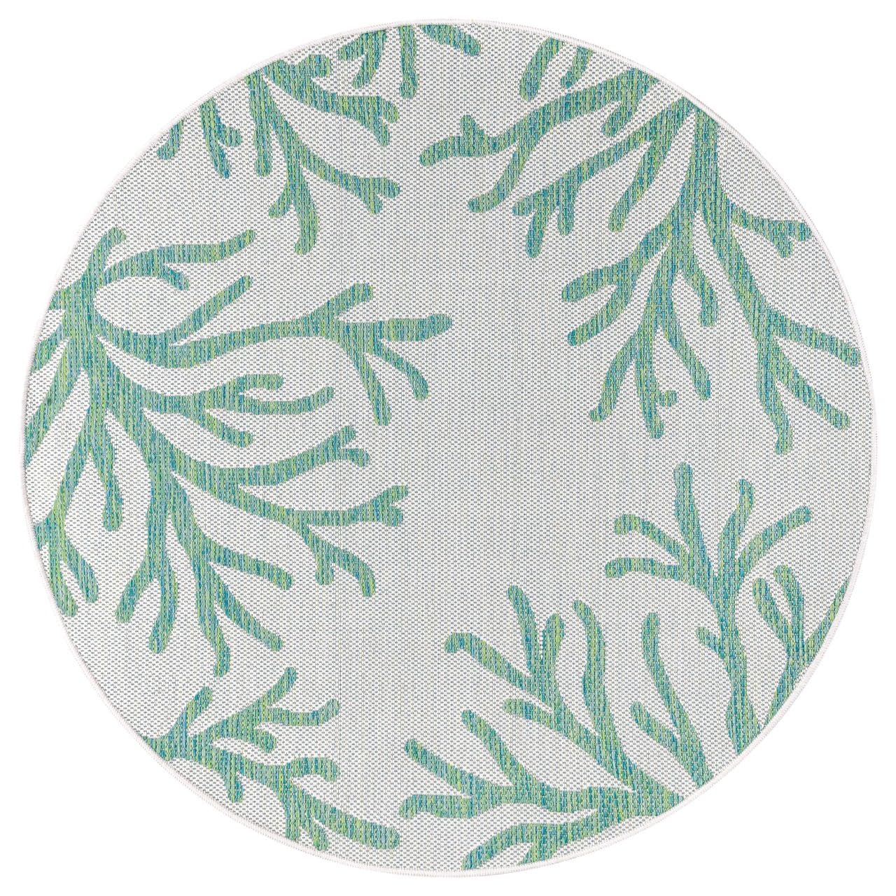 Green coral rug in beach house screened porch setting