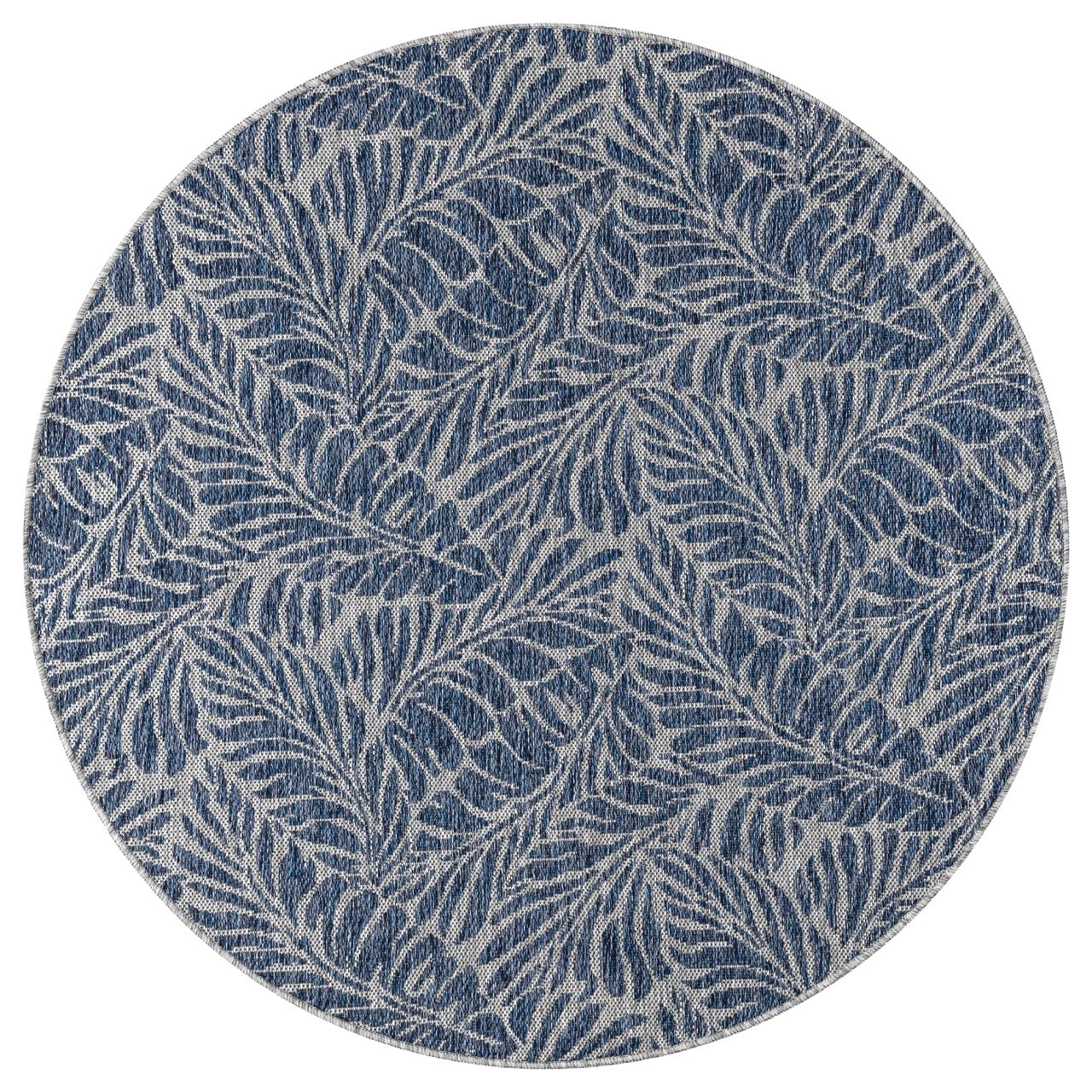 Navy tropical rug in conservatory screened porch setting