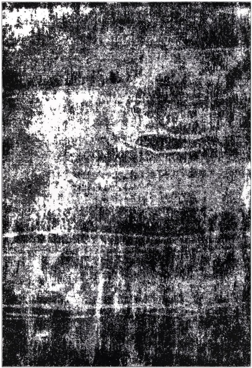 Black abstract area rug with modern watercolor design
