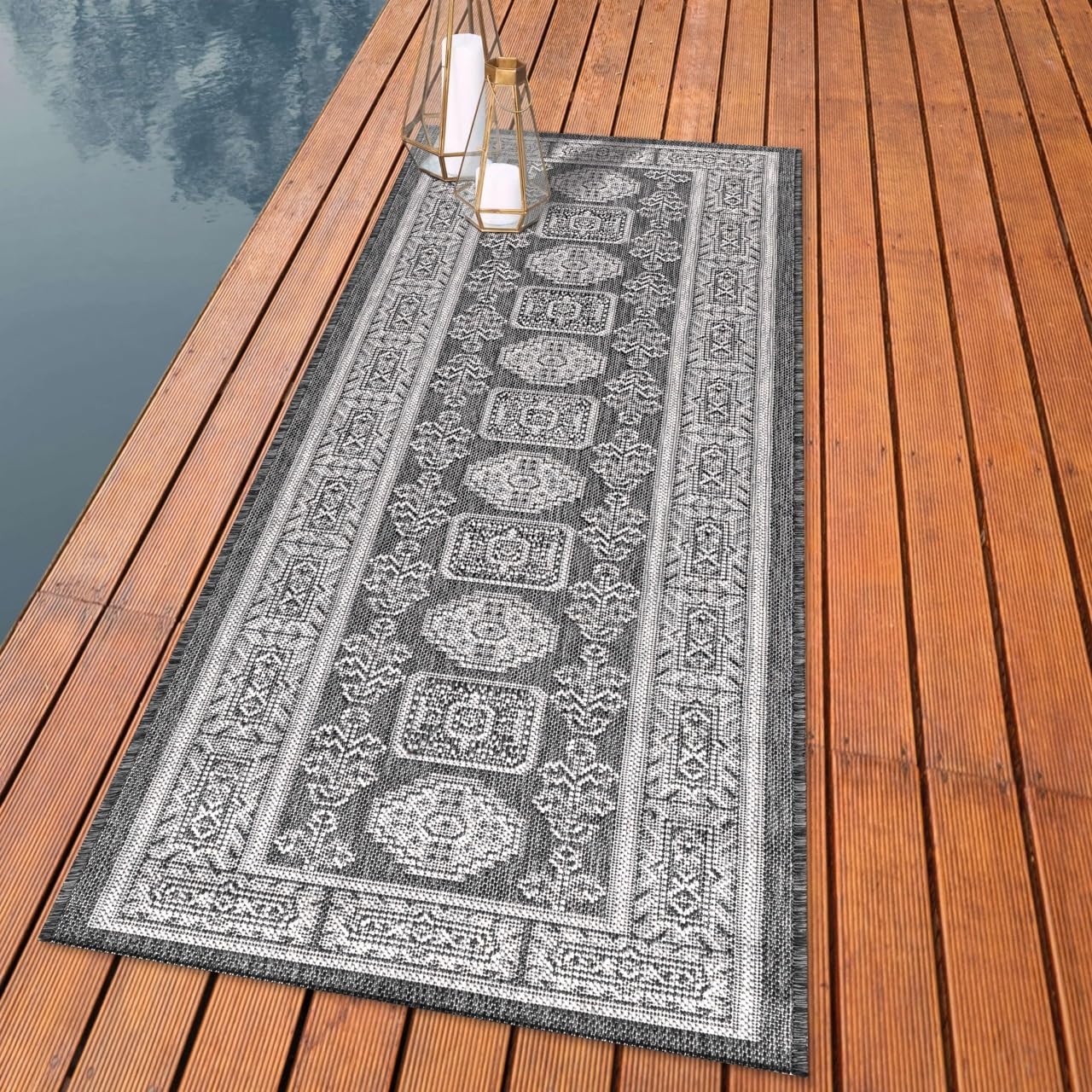 Anatolian heritage outdoor rug styled with mediterranean dining furniture