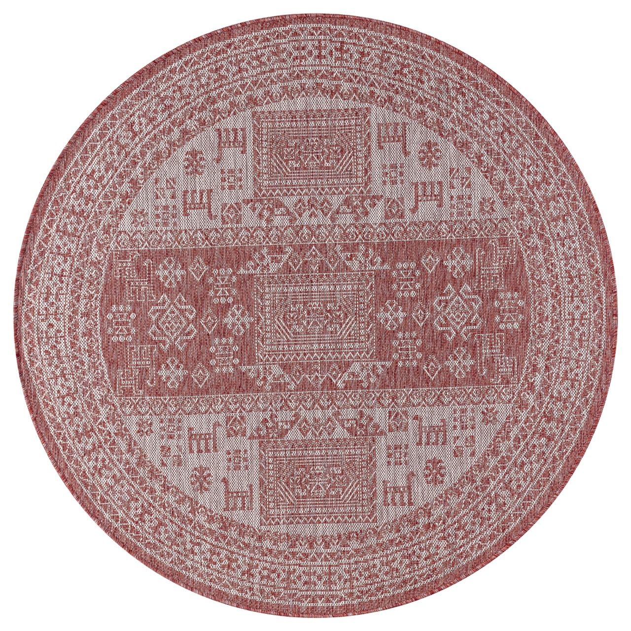 Terracotta tribal rug in southwestern-style screened porch setting