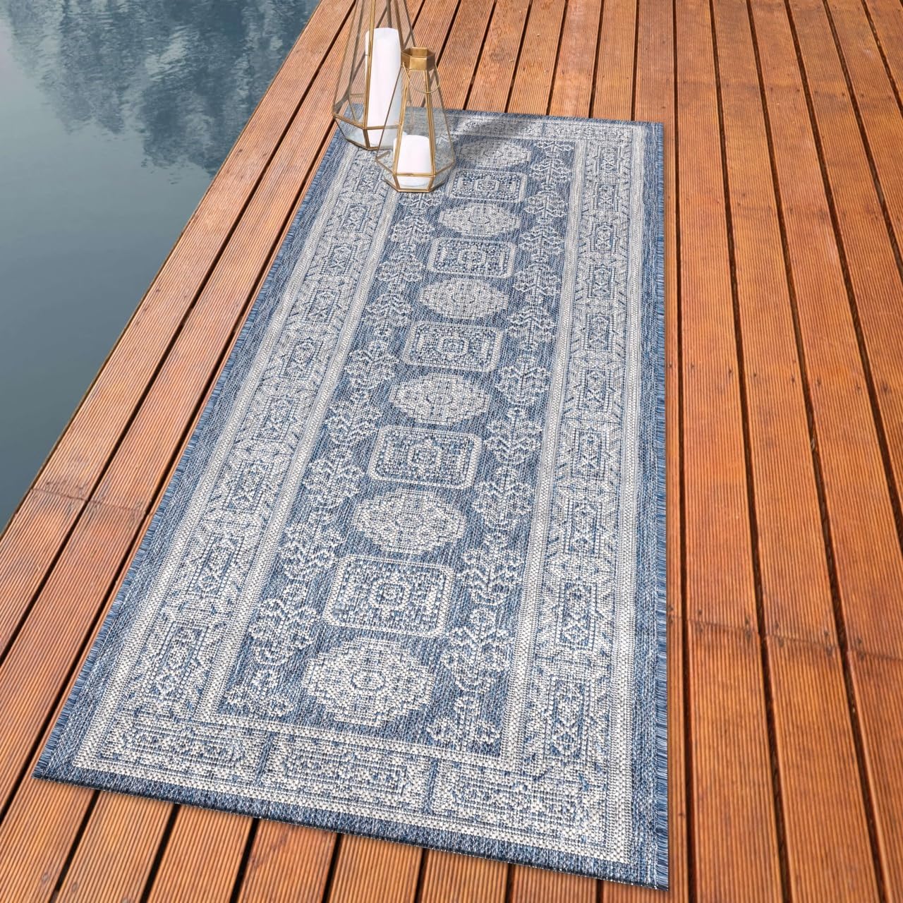 Anatolian heritage outdoor rug styled with mediterranean dining furniture