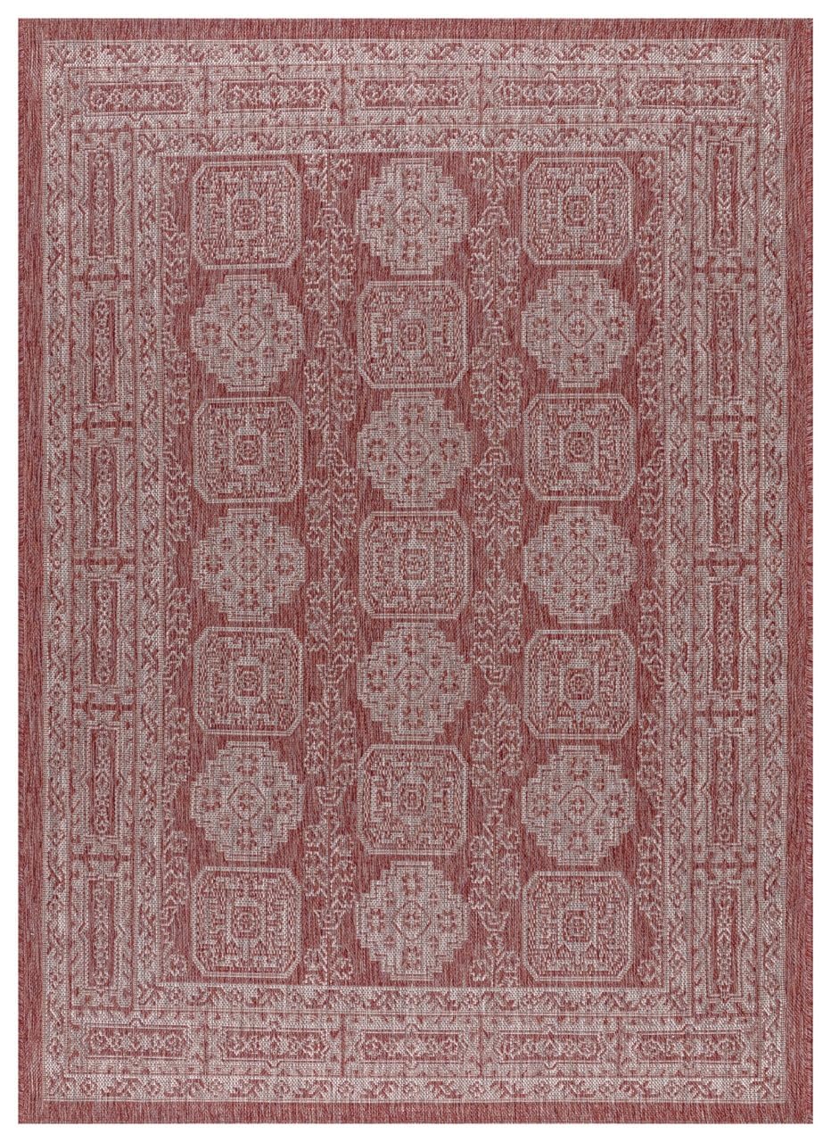 Terracotta and ivory Anatolian medallion outdoor rug on covered teak patio