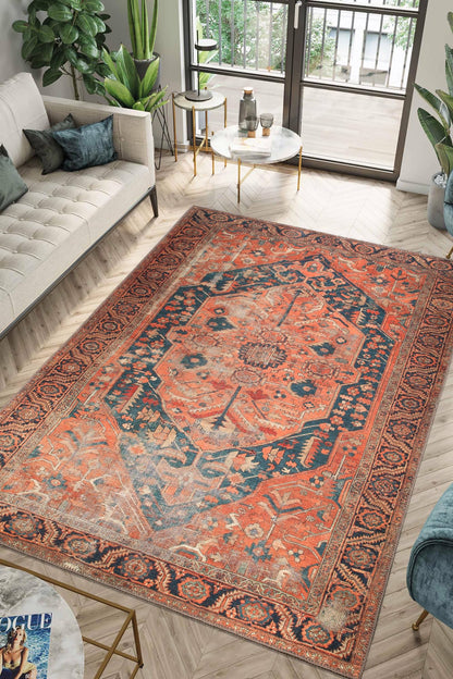 Rust orange Heriz rug styled in a designer living room