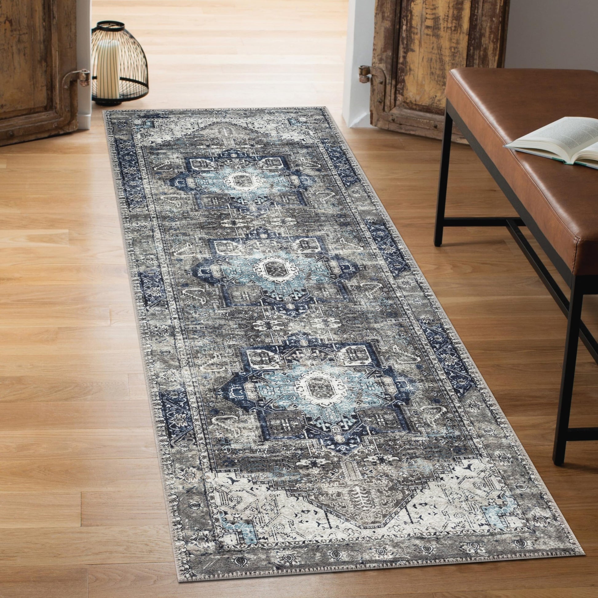Close-up of the faded Heriz medallion in dove blue and ivory