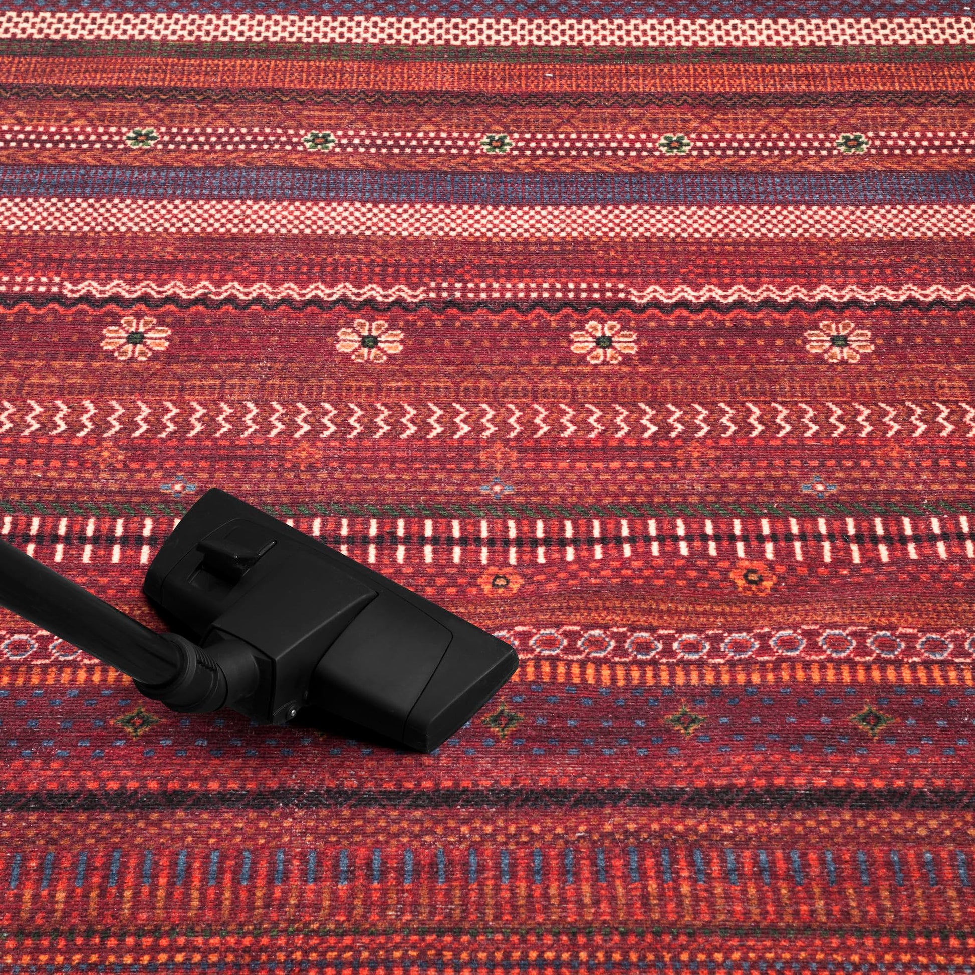 Tekke gul rug in a home office with built-in bookshelves