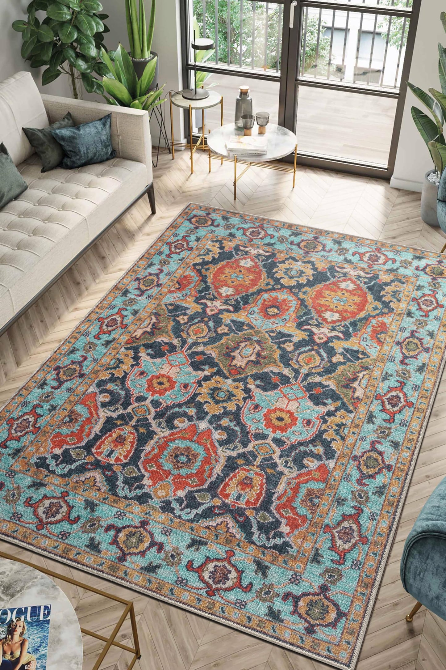 Teal Tabriz rug styled in a jewel-tone living room