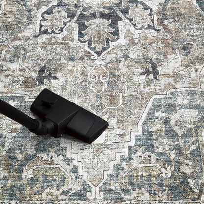 Top-down view of the ivory and teal antique Agra Indo-Persian rug