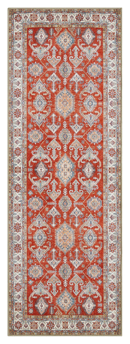 Red Kazak rug in an eclectic global-decor living room