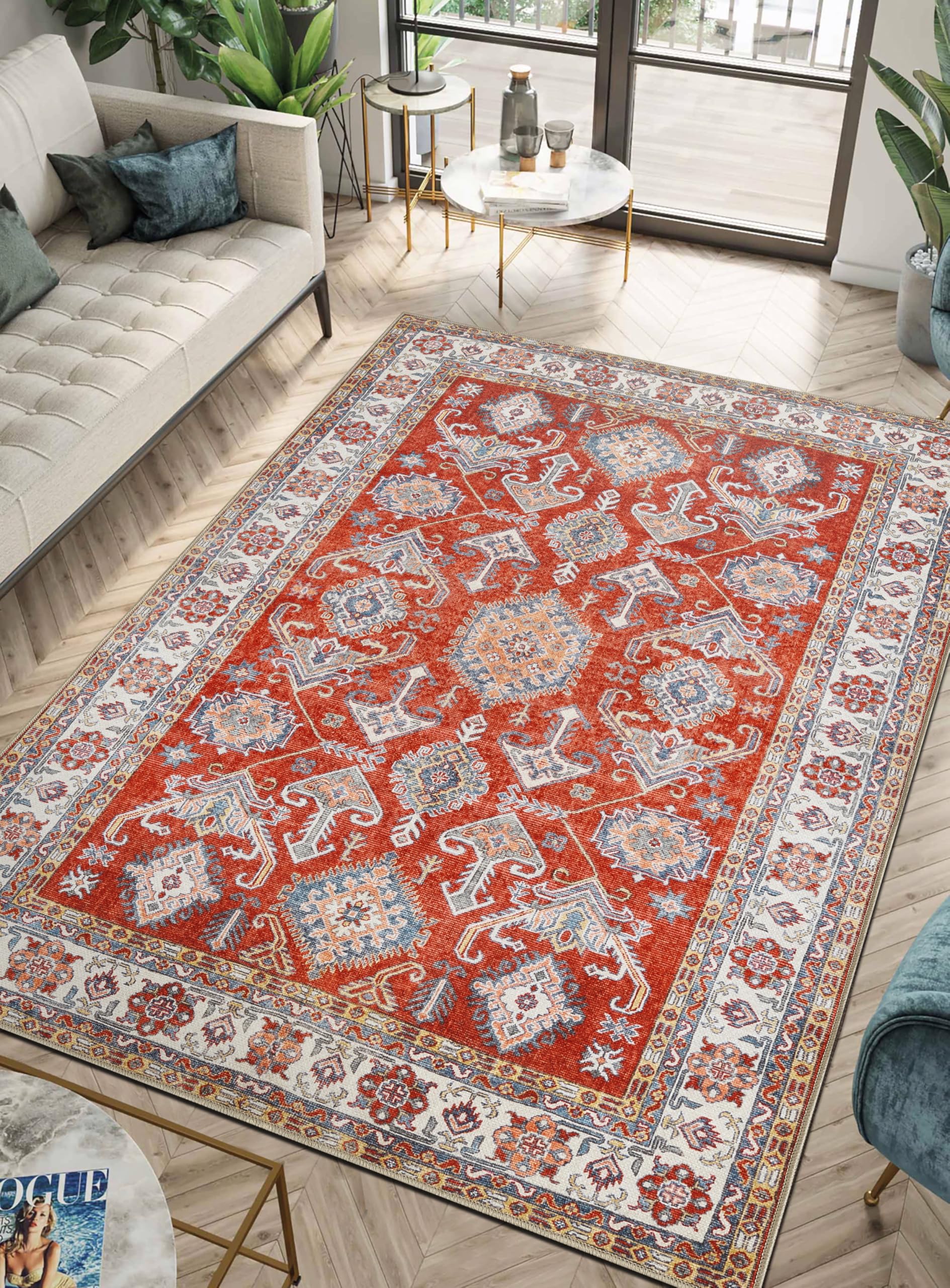 Caucasian Kazak rug under a chesterfield sofa with brass accents