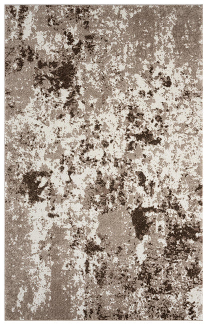 Beige and tan watercolor area rug with abstract color-blend design