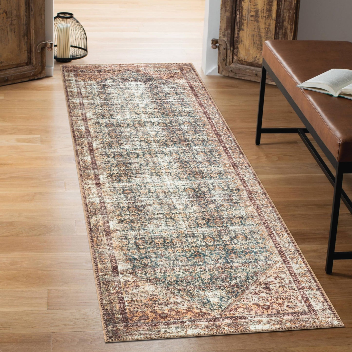 Close-up of the Malayer all-over Herati pattern in faded teal