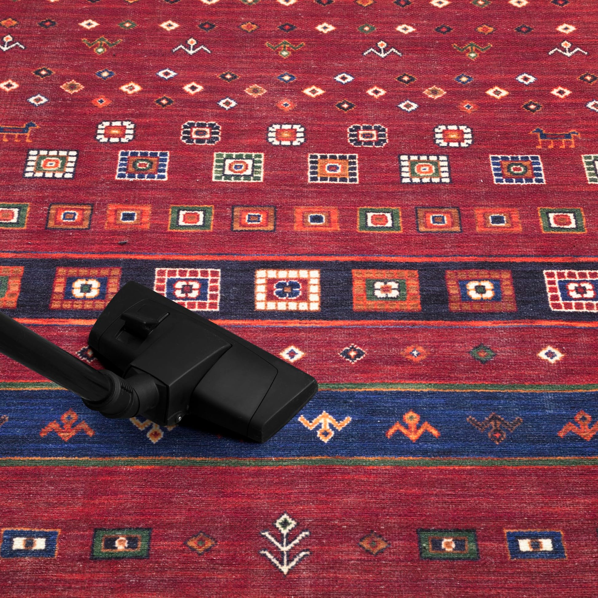 Heritage Afghan rug in a reading nook with armchair