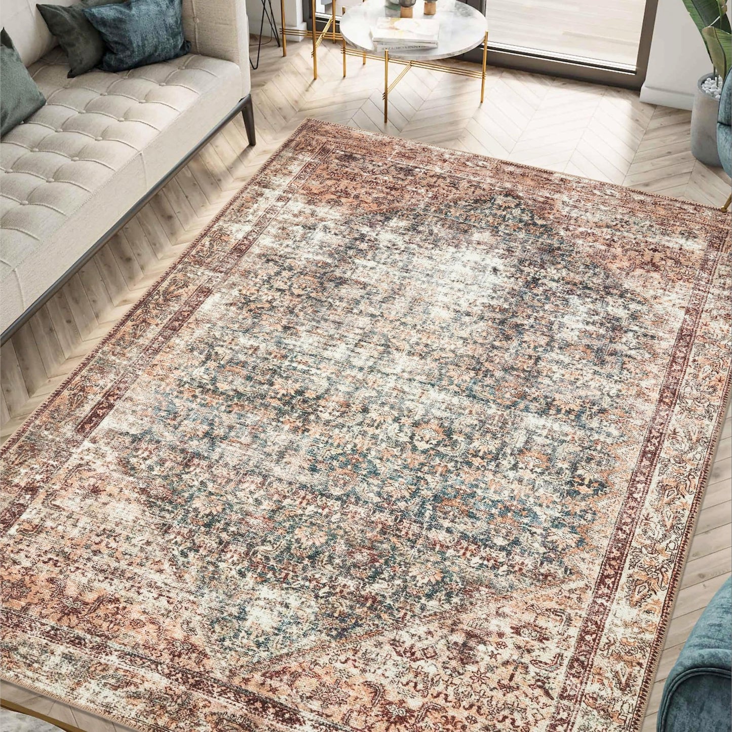 Tan Malayer rug styled in a warm farmhouse living room
