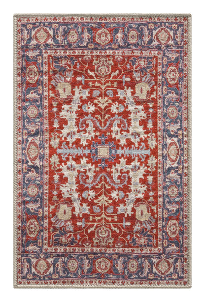 Top-down view of the crimson and teal antique Persian Serapi rug