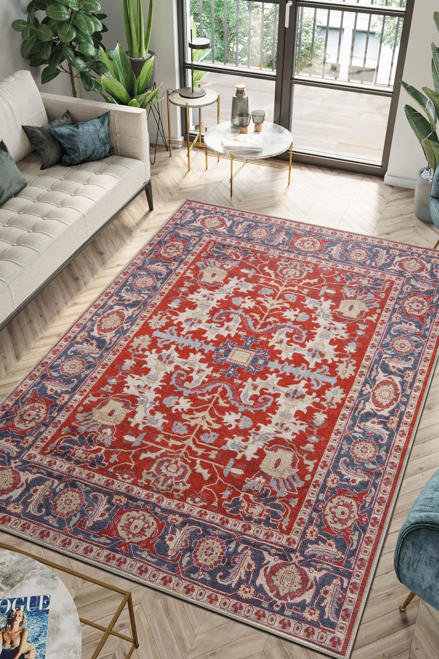 Serapi Persian rug under a leather sofa with brass accents