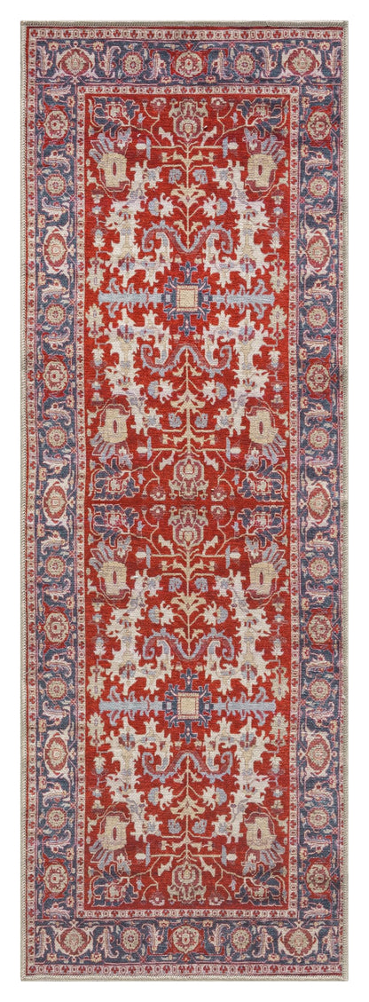 Serapi rug in a designer living room with chesterfield sofa