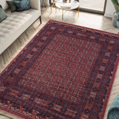 Burgundy and navy striped Afghan rug styled in a boho living room