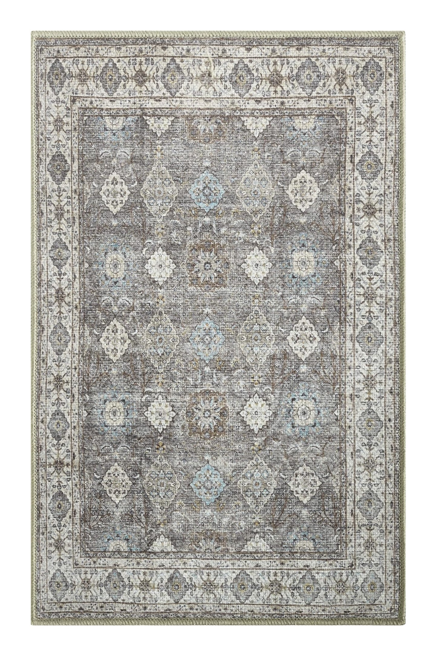 Soft blue Oushak rug in a designer reading nook with armchair