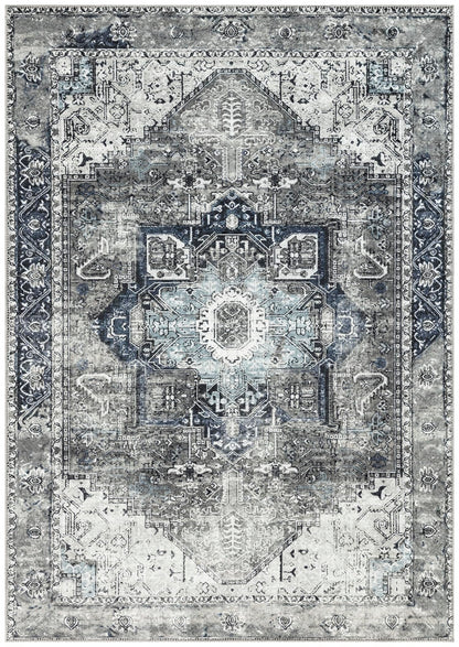 Distressed Heriz Persian area rug in charcoal gray and navy with faded medallion