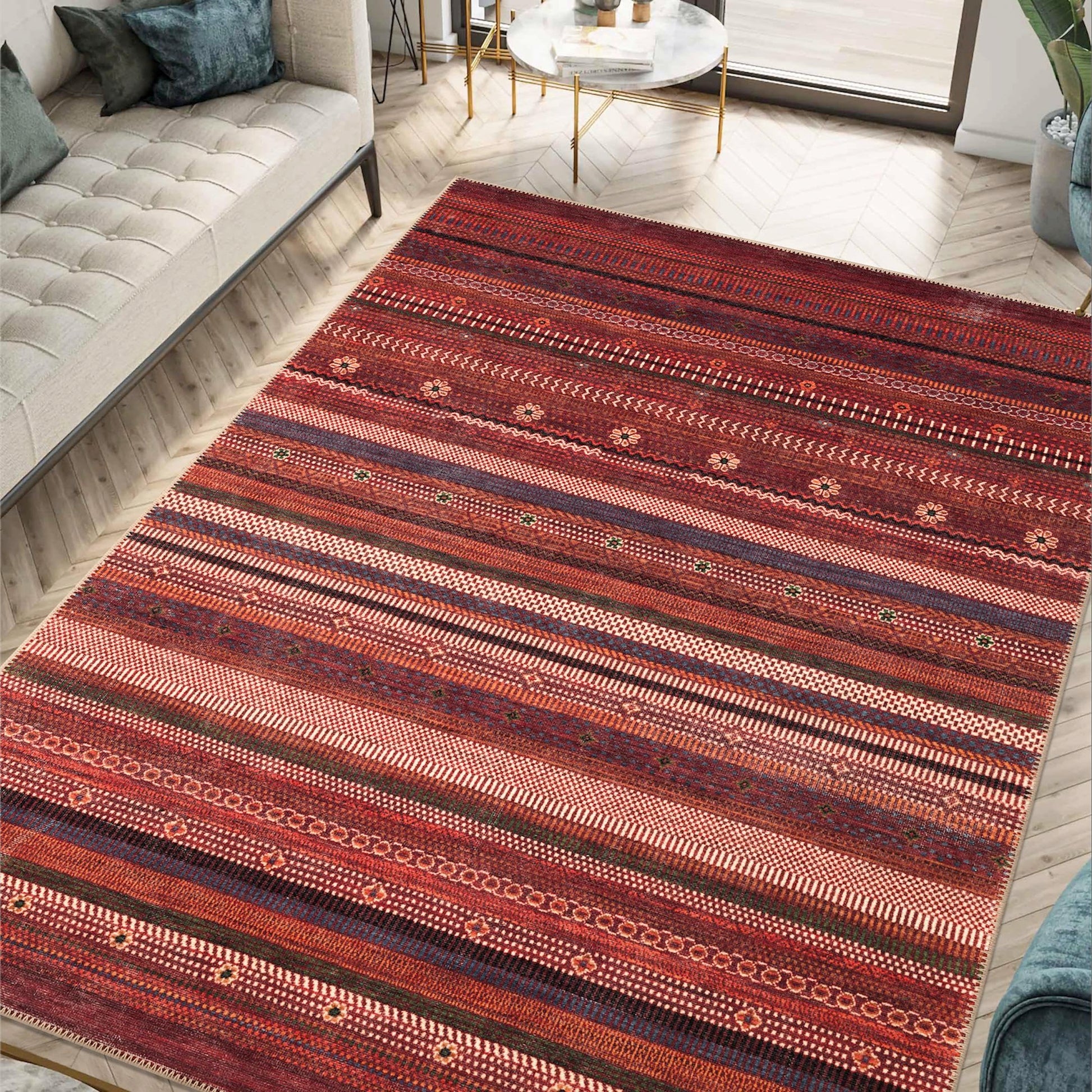 Burgundy Afghan Bukhara rug styled in a traditional library
