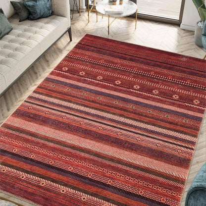 Burgundy Afghan Bukhara rug styled in a traditional library