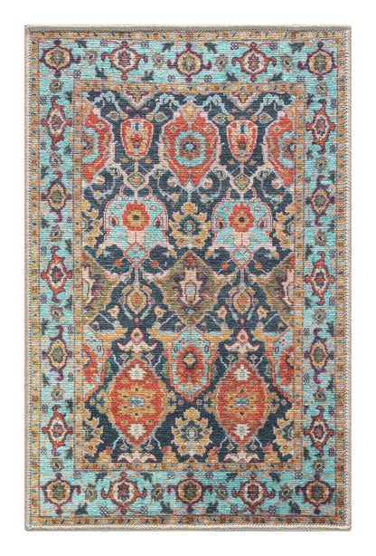 Top-down view of the teal and gold antique Tabriz Persian rug